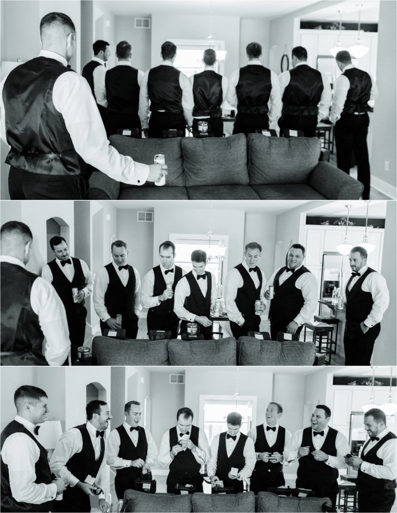 groom giving all his groomsmen their gifts